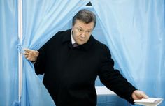 Viktor Yanukovych, head of Ukrainian leading opposition Regions Party, is ready to cast his ballot at a polling station in Kiev, capital of Ukraine, on Jan. 17, 2010. Ukrainian voters started to cast votes on Sunday to choose their next president out of 18 candidates. (Xinhua/Lu Jinbo)