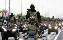  Iranian soldiers march during the Army Day parade in Tehran, Iran, April 18, 2010. Iranian President Mahmoud Ahmadinejad said here on Sunday that the interference of foreigners served the root cause of all tensions and divisions in the region, demanding foreign forces to leave the region. [Xinhua] 