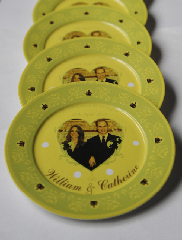 Photo taken on Jan. 10, 2011 shows the plates with the photo of Prince William and Kate Middleton on at a workshop of Tri-Ring Group Corporation in Beiliu City, south China&apos;s Guangxi Zhuang Autonomous Region.