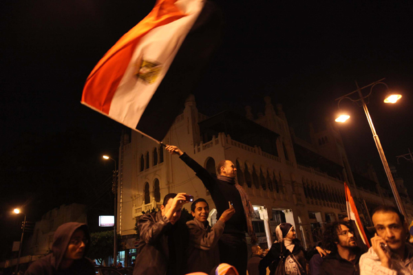 Tens of thousands of Egyptians celebrate in Cairo on February 11, 2011as Hosni Mubarak steps down after his 30 years in power. [Xinhua photo]