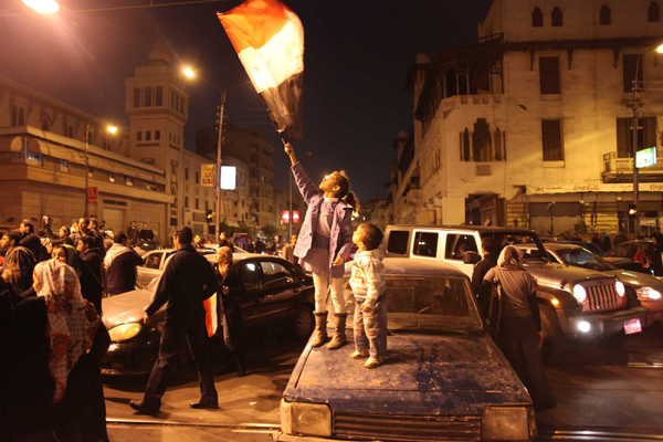 Tens of thousands of Egyptians celebrate in Cairo on February 11, 2011as Hosni Mubarak steps down after his 30 years in power. [Xinhua photo]